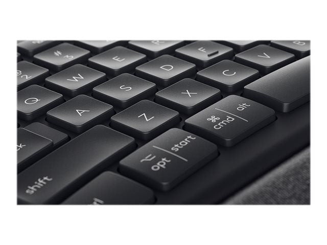 Close-up of a black keyboard with visible keys on a white background