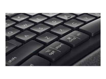Close-up of a black keyboard with visible keys on a white background