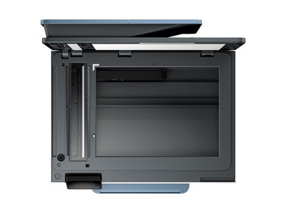 A dark gray multifunction laser printer with its top lid open, showing the scanner bed and interior drum unit, isolated on a white background.